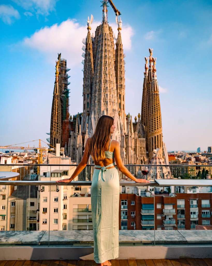 sagrada-familia barcelona with a woman